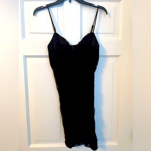 Crystal Doll.  Size Junior Medium. Black mini dress